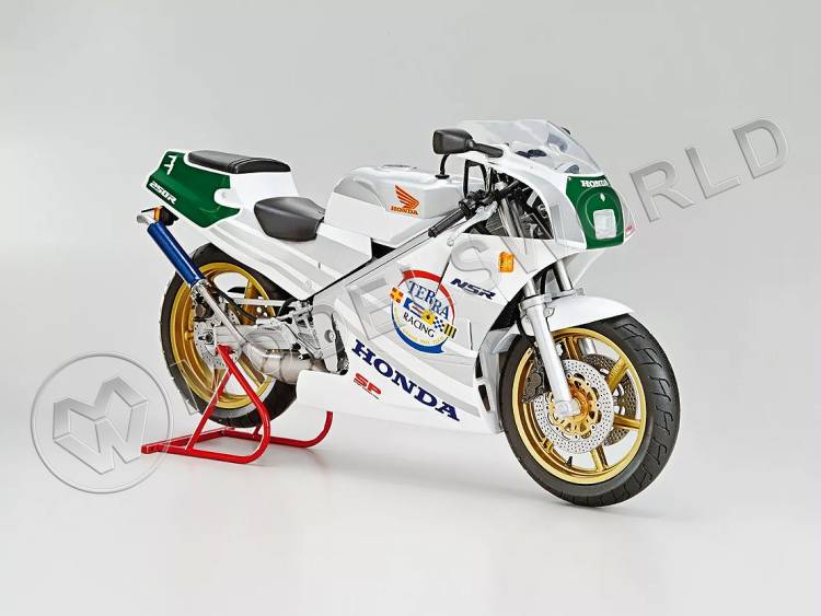 Склеиваемая пластиковая модель Honda MC18 NSR250R SP Custom '89. Масштаб 1:12 Склеиваемая пластиковая модель Honda MC18 NSR250R SP Custom '89. Масштаб 1:12 - фото 1